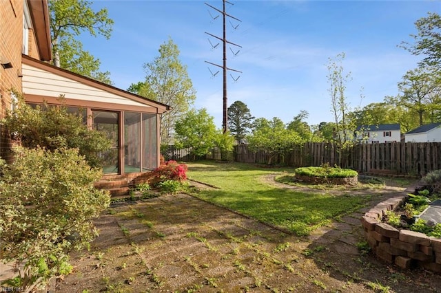 112 Farmington Blvd, Hampton, VA 23666 - fenced backyard with a sunroom