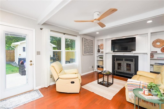 1964 Nettle St, Virginia Beach, VA 23453 - living area featuring beam ceiling, plenty of natural light, wood finished floors, ceiling fan, and a glass covered fireplace