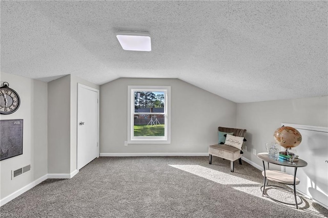 3905 Stonebridge Ct, Chesapeake, VA 23321 - sitting room featuring carpet flooring, vaulted ceiling, and a textured ceiling