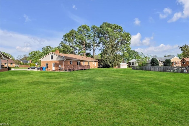 3905 Stonebridge Ct, Chesapeake, VA 23321 - view of yard featuring a deck and a shed