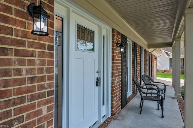 3905 Stonebridge Ct, Chesapeake, VA 23321 - property entrance featuring covered porch and brick siding