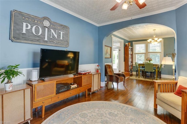 122 S Willard Ave, Hampton, VA 23663 - living room with arched walkways, hardwood / wood-style floors, a chandelier, crown molding, and wainscoting
