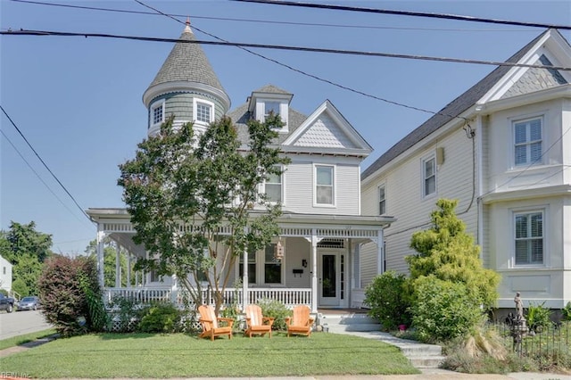 122 S Willard Ave, Hampton, VA 23663 - victorian home featuring a porch and a front yard