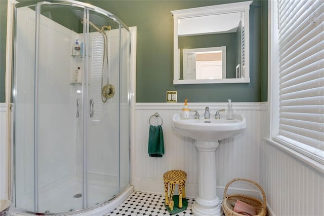 122 S Willard Ave, Hampton, VA 23663 - bathroom featuring wainscoting, a stall shower, and tile patterned floors