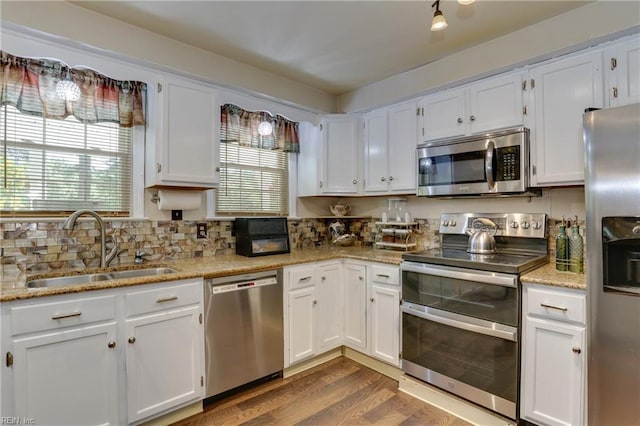 6285 Buckley Hall Rd, Cobbs Creek, VA 23035 - kitchen featuring appliances with stainless steel finishes and white cabinetry