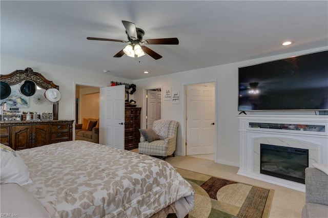 6285 Buckley Hall Rd, Cobbs Creek, VA 23035 - bedroom with light carpet, recessed lighting, ceiling fan, and a fireplace