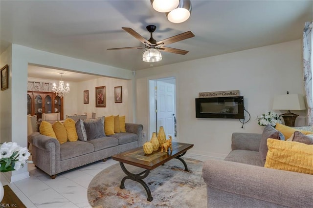 6285 Buckley Hall Rd, Cobbs Creek, VA 23035 - living room with a chandelier, a ceiling fan, and light marble finish flooring