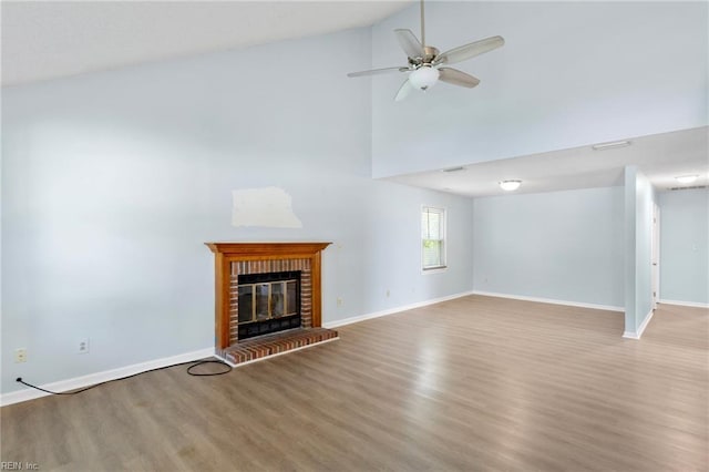1117 Tibbetstown Ct, Virginia Beach, VA 23454 - unfurnished living room featuring wood finished floors, high vaulted ceiling, ceiling fan, and a fireplace