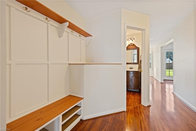 3015 Beech Grove Ln, Suffolk, VA 23435 - mudroom featuring wood finished floors and a sink