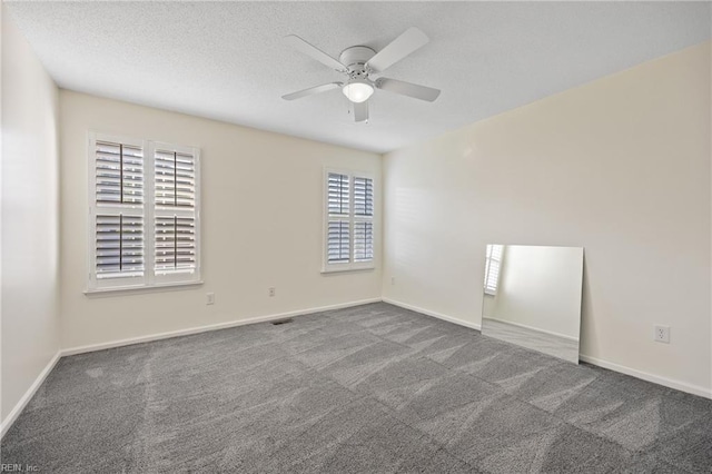 3015 Beech Grove Ln, Suffolk, VA 23435 - carpeted spare room featuring ceiling fan and a textured ceiling