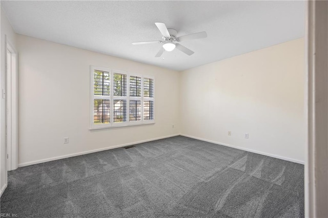 3015 Beech Grove Ln, Suffolk, VA 23435 - unfurnished room with dark carpet and ceiling fan