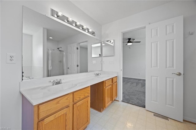 3015 Beech Grove Ln, Suffolk, VA 23435 - full bath featuring double vanity, a stall shower, a ceiling fan, and tile patterned floors