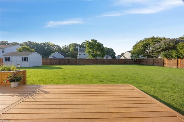 3015 Beech Grove Ln, Suffolk, VA 23435 - wooden terrace featuring a fenced backyard and an outbuilding