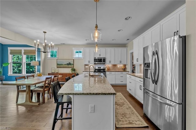 112 Gleneagles, Smithfield, VA 23430 - kitchen with appliances with stainless steel finishes, plenty of natural light, white cabinets, and recessed lighting