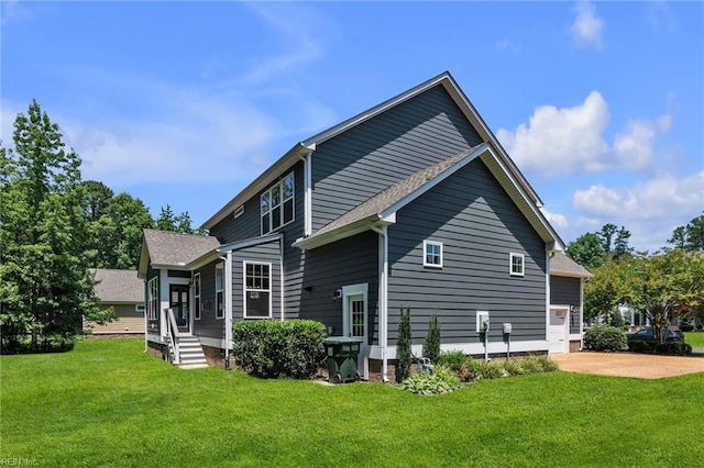 112 Gleneagles, Smithfield, VA 23430 - rear view of property featuring a lawn