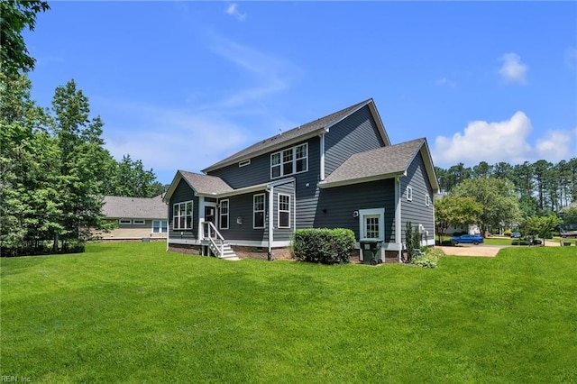 112 Gleneagles, Smithfield, VA 23430 - rear view of house with a yard and roof with shingles