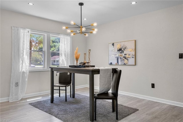 21 Rodgers Pl, Portsmouth, VA 23702 - dining space with a chandelier, wood finished floors, and recessed lighting