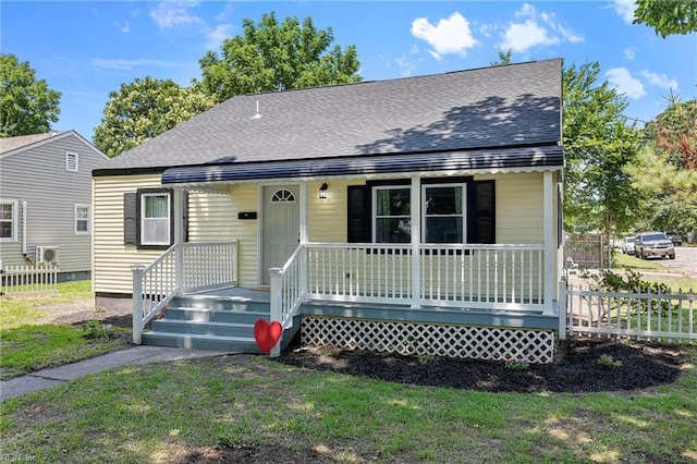 21 Rodgers Pl, Portsmouth, VA 23702 - bungalow-style house featuring covered porch and roof with shingles