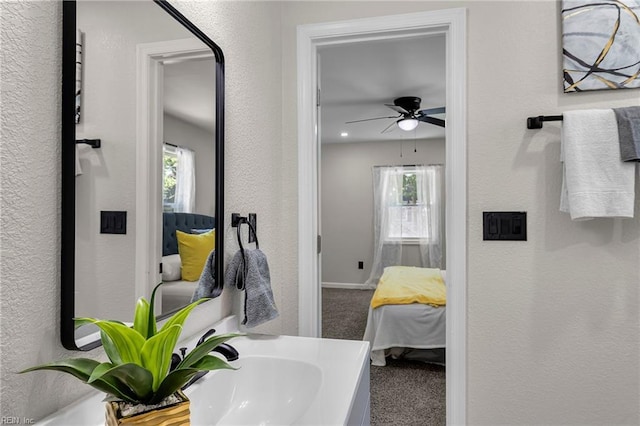 21 Rodgers Pl, Portsmouth, VA 23702 - bathroom featuring ensuite bathroom, ceiling fan, and a textured wall