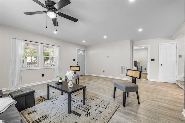 21 Rodgers Pl, Portsmouth, VA 23702 - living room with light wood-style flooring, recessed lighting, ceiling fan, and stairs