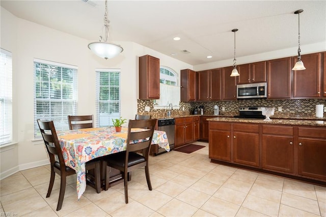 1304 Kemp Bridge Dr, Chesapeake, VA 23320 - kitchen with appliances with stainless steel finishes, tasteful backsplash, pendant lighting, light tile patterned floors, and recessed lighting