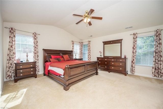 1304 Kemp Bridge Dr, Chesapeake, VA 23320 - carpeted bedroom with vaulted ceiling, multiple windows, and ceiling fan