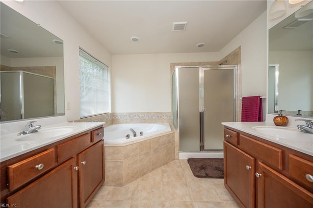 1304 Kemp Bridge Dr, Chesapeake, VA 23320 - full bathroom featuring two vanities, a stall shower, a bath, and tile patterned floors