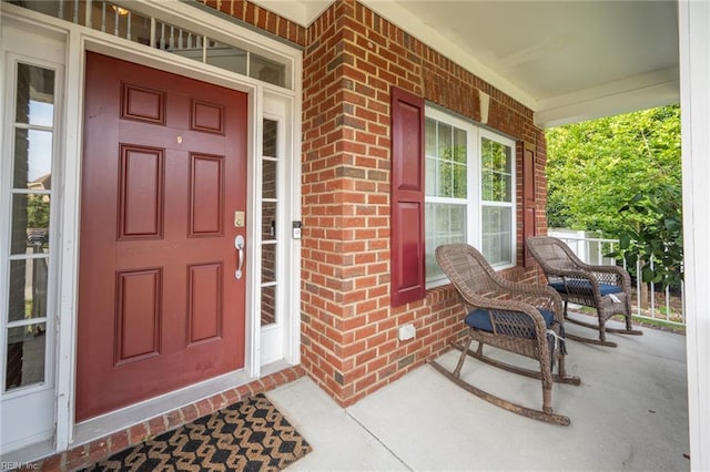 1304 Kemp Bridge Dr, Chesapeake, VA 23320 - entrance to property featuring covered porch and brick siding
