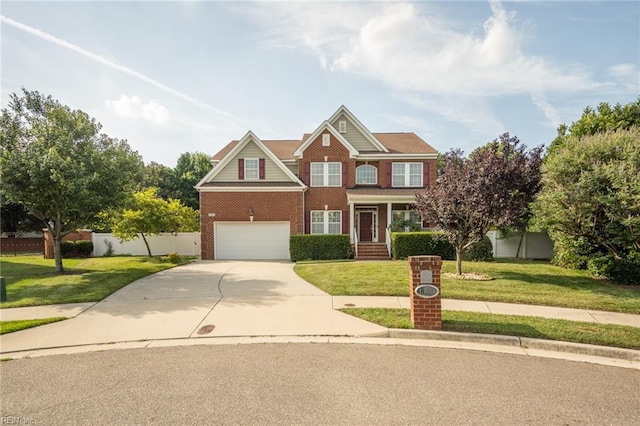 1304 Kemp Bridge Dr, Chesapeake, VA 23320 - view of front of house with brick siding, an attached garage, and concrete driveway