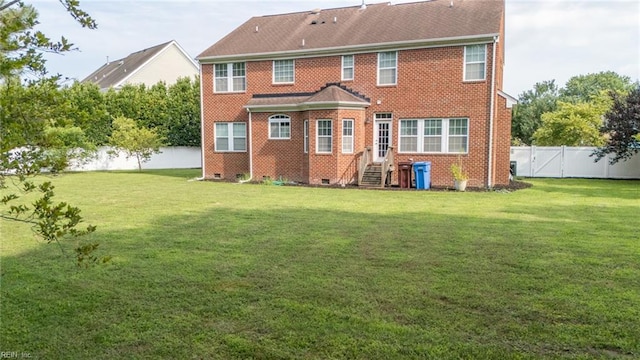 1304 Kemp Bridge Dr, Chesapeake, VA 23320 - rear view of property with crawl space, brick siding, and a fenced backyard