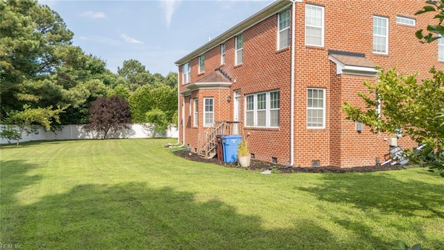 1304 Kemp Bridge Dr, Chesapeake, VA 23320 - back of property with crawl space and brick siding