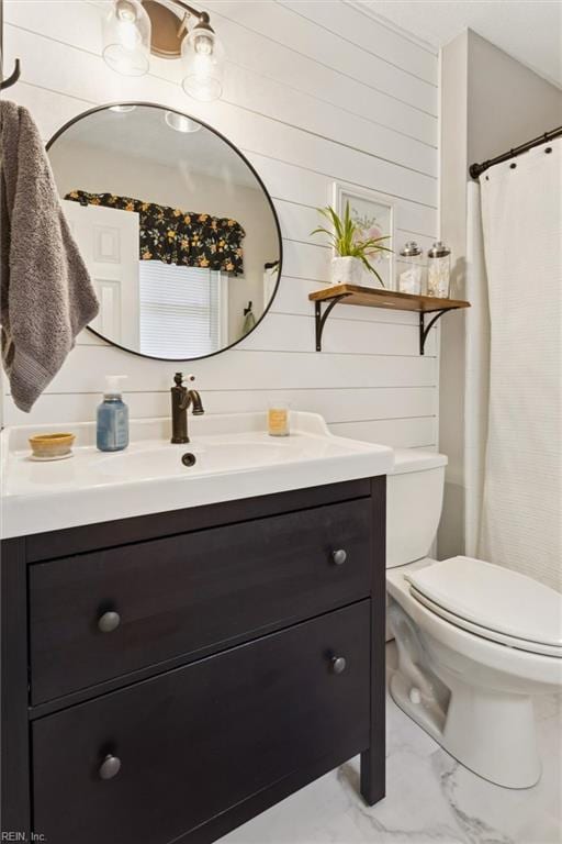 278 Mallard Dr, Hardyville, VA 23070 - bathroom with marble look tile flooring, vanity, and wood walls