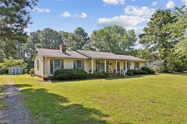 278 Mallard Dr, Hardyville, VA 23070 - single story home featuring a storage shed, covered porch, a chimney, and a front lawn