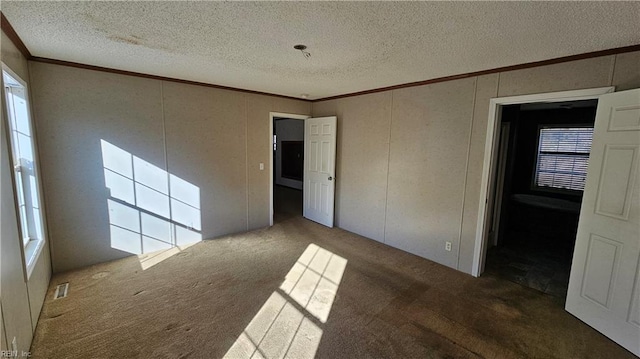 4371 Providence Rd, Hayes, VA 23072 - carpeted spare room with crown molding and a textured ceiling