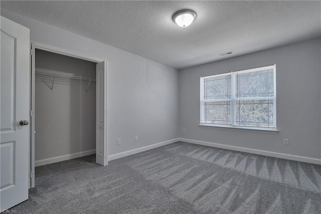 115 Pescara Ln, Newport News, VA 23601 - unfurnished bedroom featuring carpet flooring, a textured ceiling, and a closet