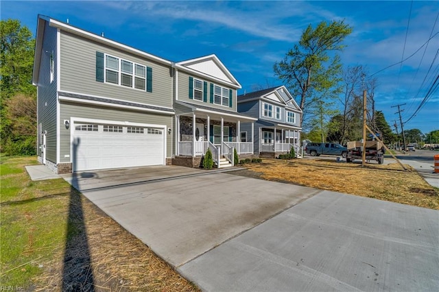 115 Pescara Ln, Newport News, VA 23601 - view of front of property with a porch, concrete driveway, and a garage