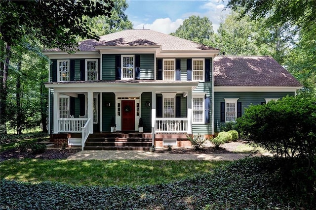 116 W Links, Williamsburg, VA 23188 - colonial-style house featuring covered porch and roof with shingles