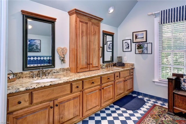 116 W Links, Williamsburg, VA 23188 - full bathroom with lofted ceiling, double vanity, tile patterned floors, and recessed lighting