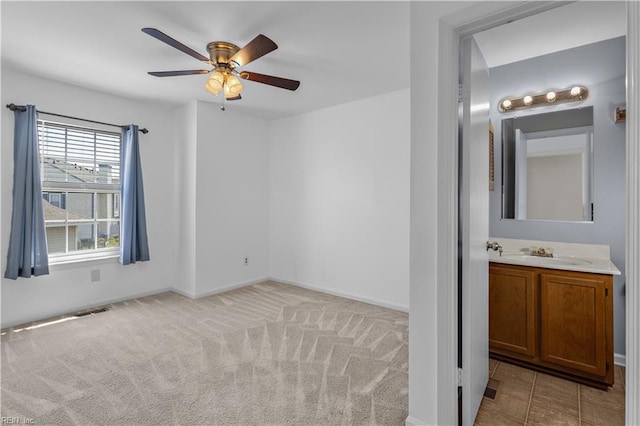 625 Ridge Cir, Chesapeake, VA 23320 - spare room with a ceiling fan and light colored carpet