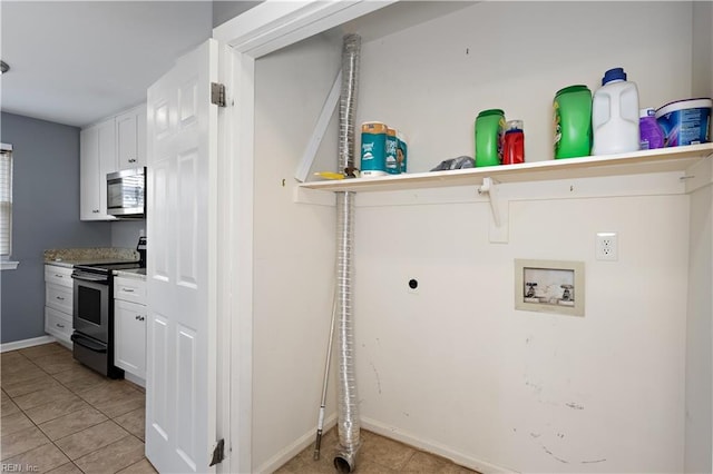 625 Ridge Cir, Chesapeake, VA 23320 - laundry room featuring washer hookup, hookup for an electric dryer, and light tile patterned floors