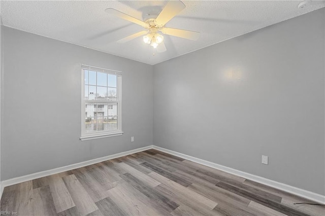 515 Wharf Ct, Virginia Beach, VA 23462 - spare room with wood finished floors, ceiling fan, and a textured ceiling