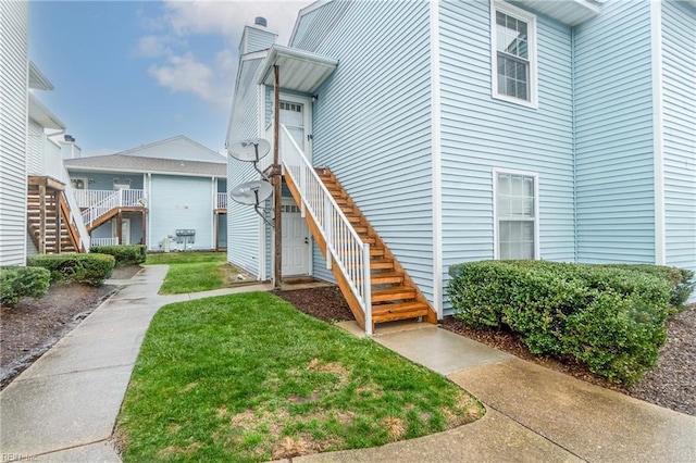 515 Wharf Ct, Virginia Beach, VA 23462 - doorway to property featuring a lawn
