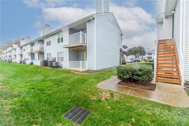 515 Wharf Ct, Virginia Beach, VA 23462 - view of building exterior with stairway and a residential view