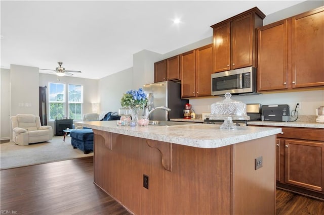 4315 Sconce, Williamsburg, VA 23188 - kitchen with stainless steel appliances, open floor plan, light countertops, and dark wood-style floors