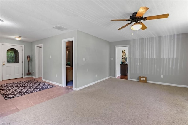 1292 Holly Point Rd, Virginia Beach, VA 23454 - foyer entrance with carpet, ceiling fan, and tile patterned floors