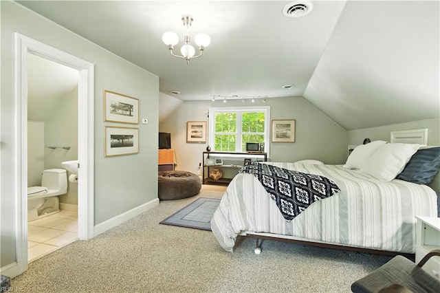 1832 Pitchkettle Rd, Suffolk, VA 23434 - carpeted bedroom with lofted ceiling, connected bathroom, and a chandelier