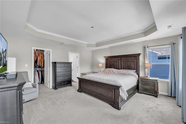 1014 Raven Hill Rd, Suffolk, VA 23434 - bedroom with a raised ceiling, light carpet, ornamental molding, a walk in closet, and a closet