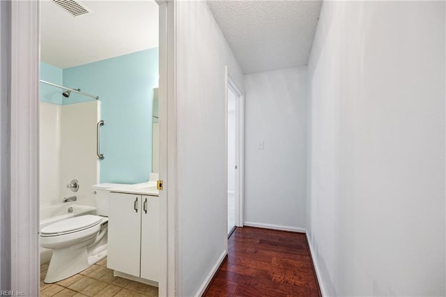 563 Seahorse Run, Chesapeake, VA 23320 - full bath with vanity, bathtub / shower combination, and a textured ceiling