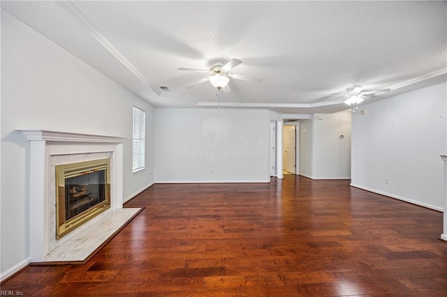 563 Seahorse Run, Chesapeake, VA 23320 - unfurnished living room featuring ceiling fan, a textured ceiling, wood finished floors, and a high end fireplace
