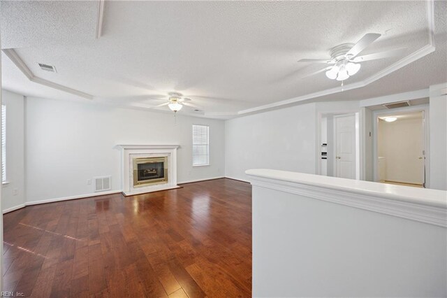 563 Seahorse Run, Chesapeake, VA 23320 - unfurnished living room with ceiling fan, a textured ceiling, wood finished floors, and a fireplace